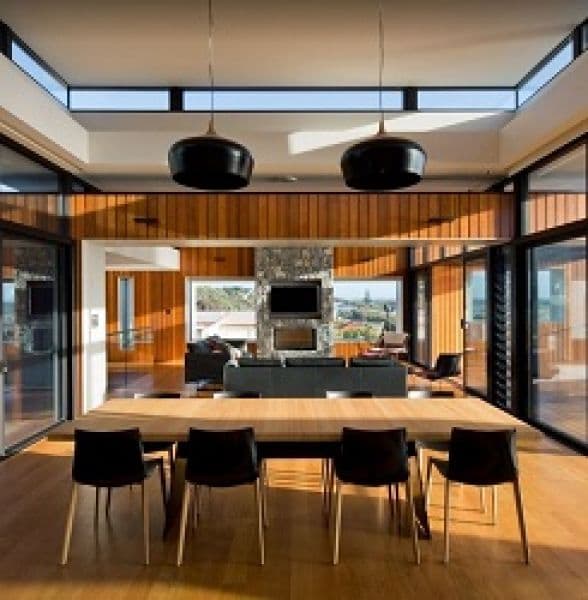 Flinders Bay Beach House - There are days when you want to be able to open up the house completely to the elements. A dining room like no other. Photo by Angus Martin Photography