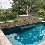 Frameless Glass resort style pool - Frameless glass fencing ensures this pool is safe and meets pool fencing regulations whilst maintaining the beautiful resort style surrounds.